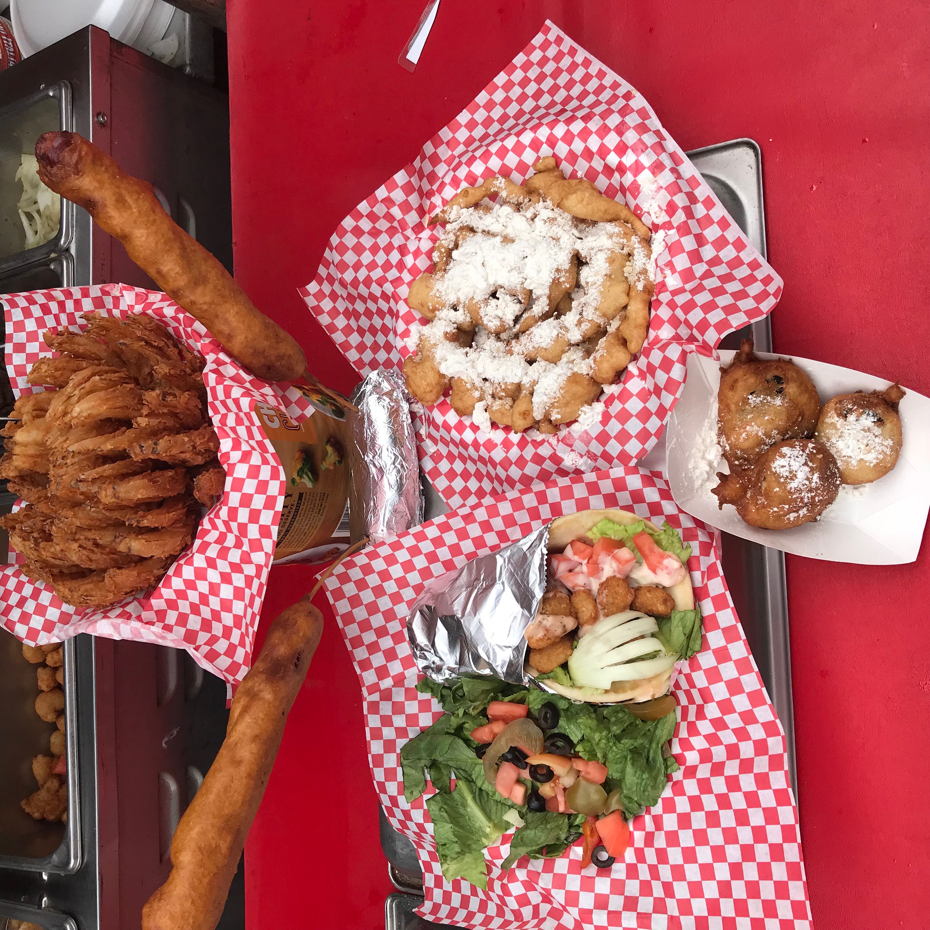 Delicious Cactus Jacks food including funnel cake, wraps, and fried specialties
